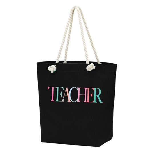 Black tote bag with 'TEACHER' in colorful letters and rope handles on a white background, and inside zipper! bagNook.com
